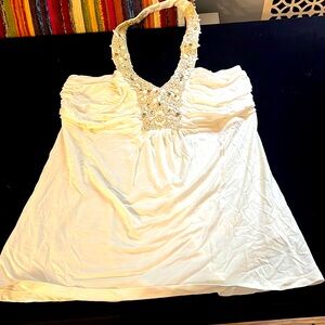 Cream halter top. Soft with beading details.